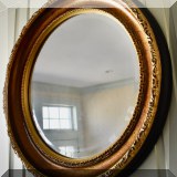 D04. Round beveled edge mirror. 32”h 